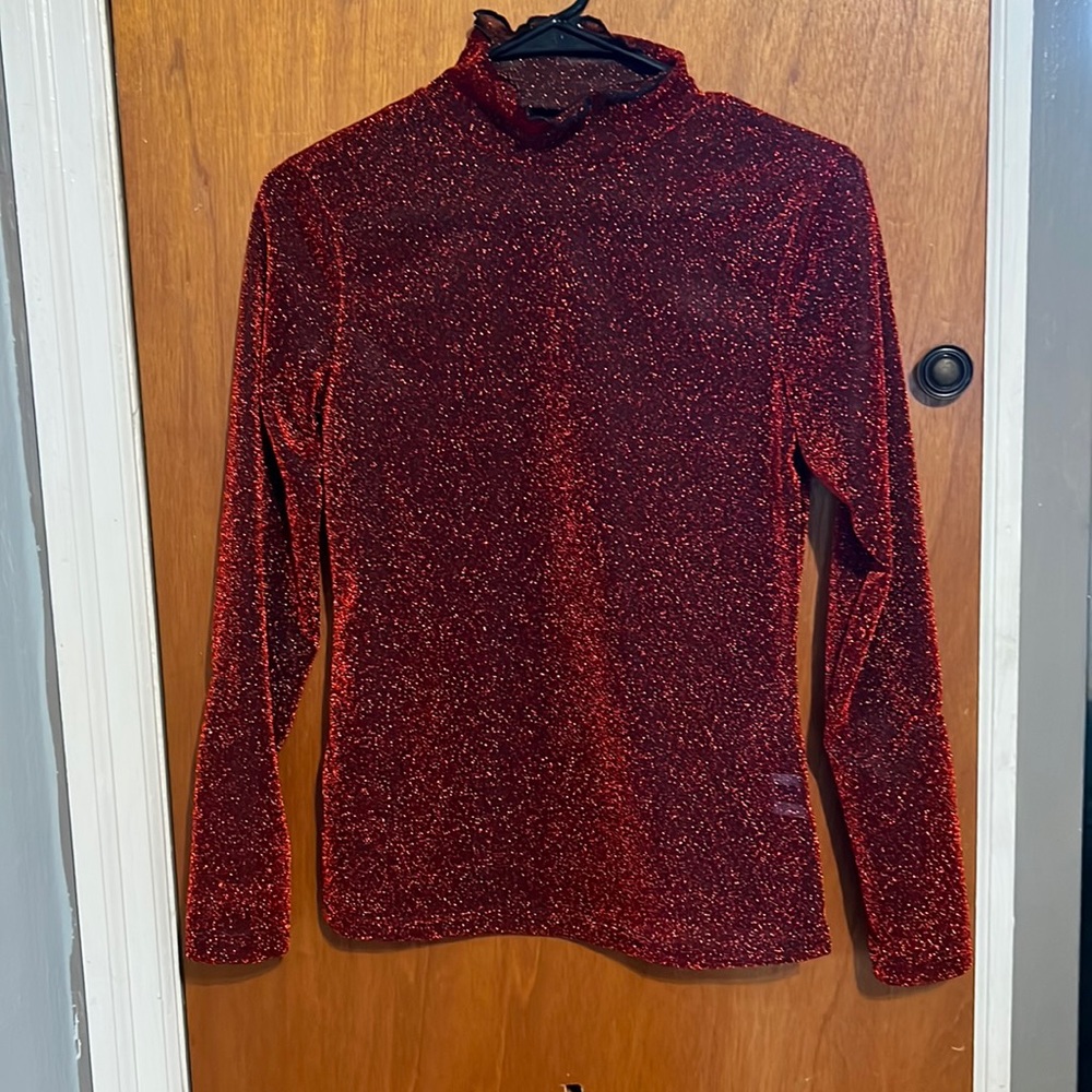 A beautiful red glitter see through top